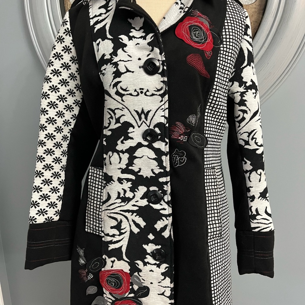 31- Women's Black and White Patterned Coat with Red Accents